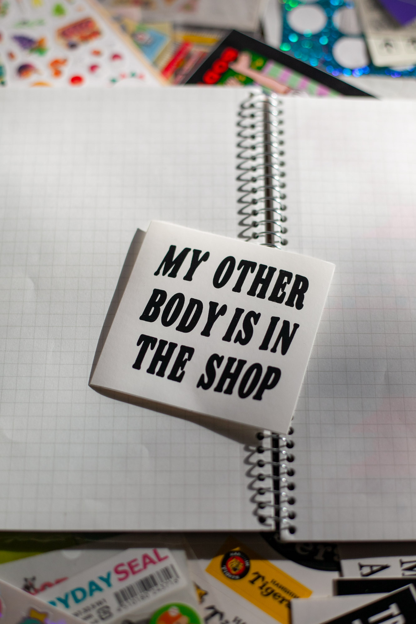my other body is in the shop black ink on white
