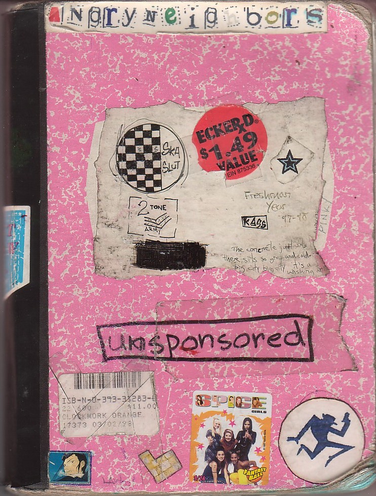 pink composition notebook with homemade ska stickers