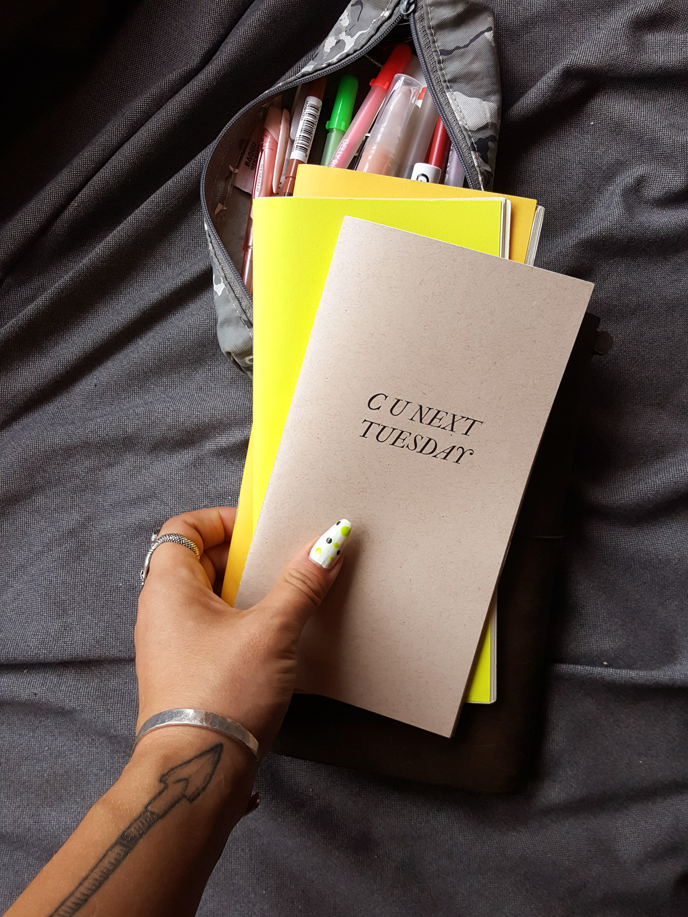 hand holding 2018 version of planner