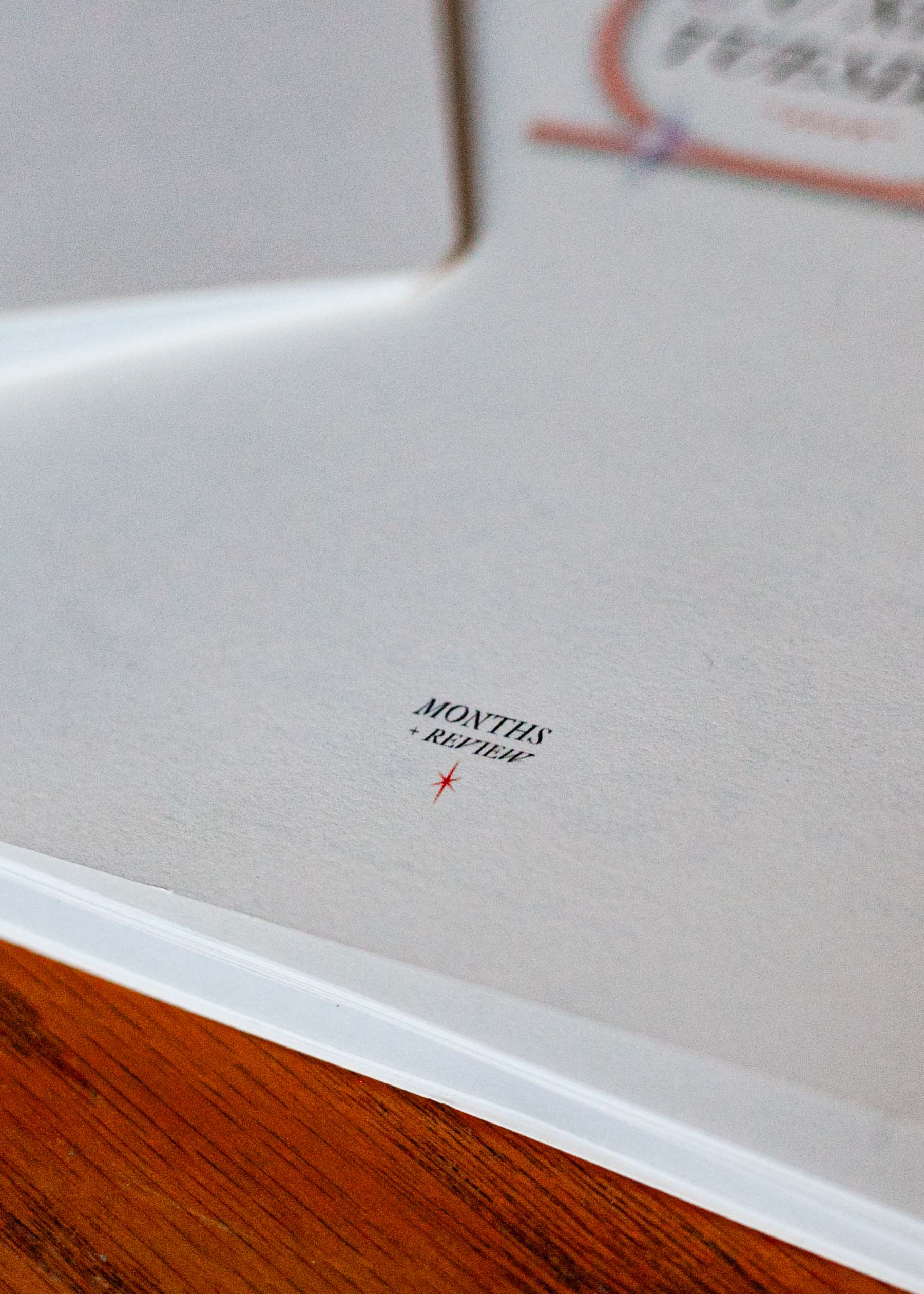 close-up of MONTHS+REVIEW cover